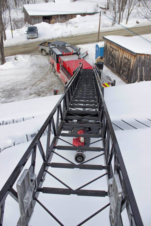 looking down ladder onto truck